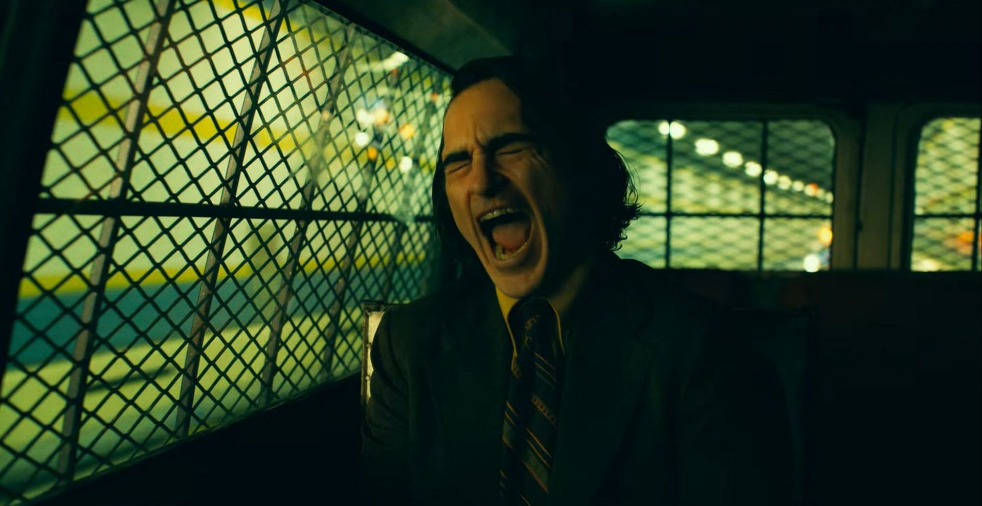 Arthur laughing the Joker smile (Image via Warner Bros. Pictures)