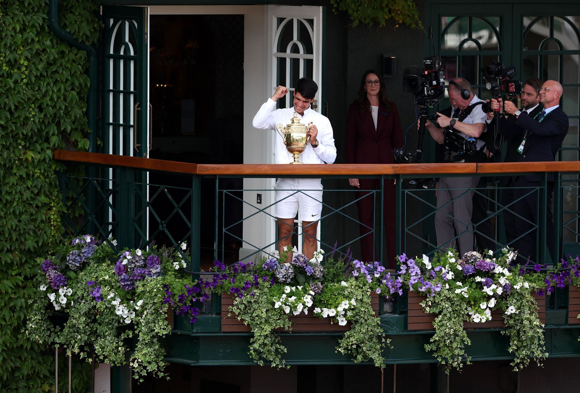 Carlos Alcaraz with the Wimbledon trophy.