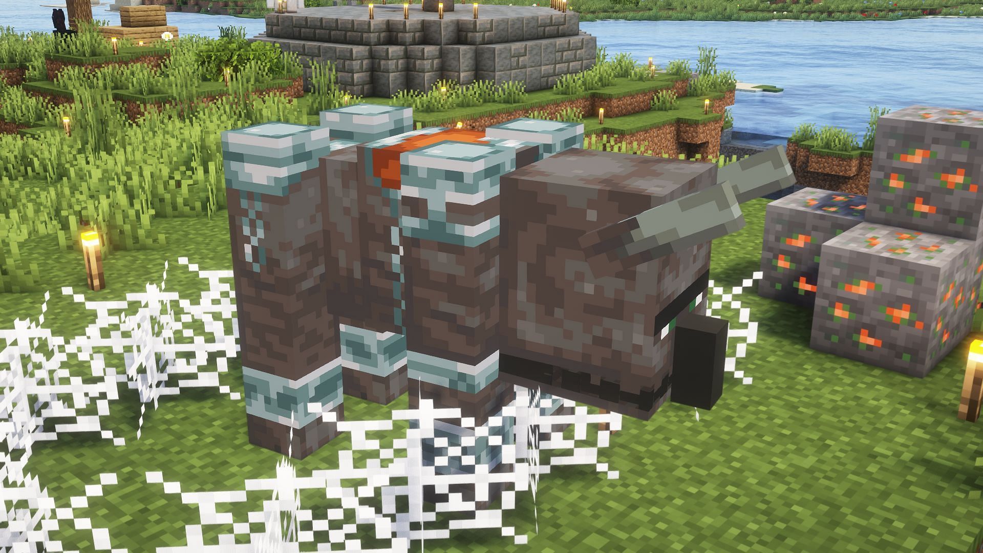 Even large mobs like ravagers are affected by cobwebs (Image via Mojang)