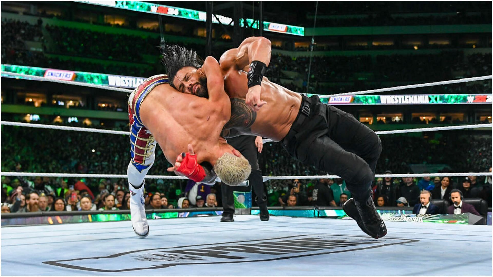 Cody Rhodes and Roman Reigns at WWE WrestleMania. (Image via WWE.com)