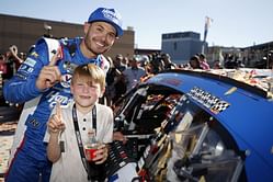 Kyle Larson and wife Katelyn Larson show their support to son Owen in his junior sprint win at Coles County