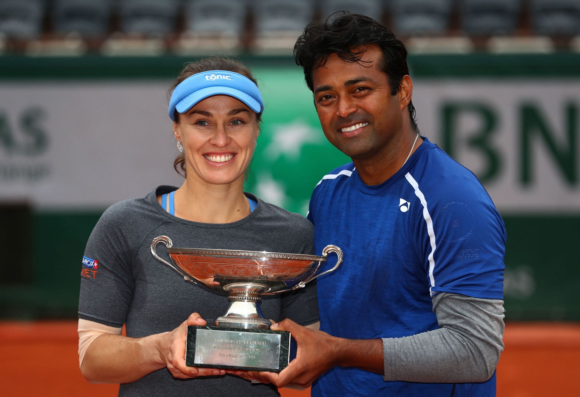 Martina Hingis (left) and Leander Paes after winning the 2016 French Open