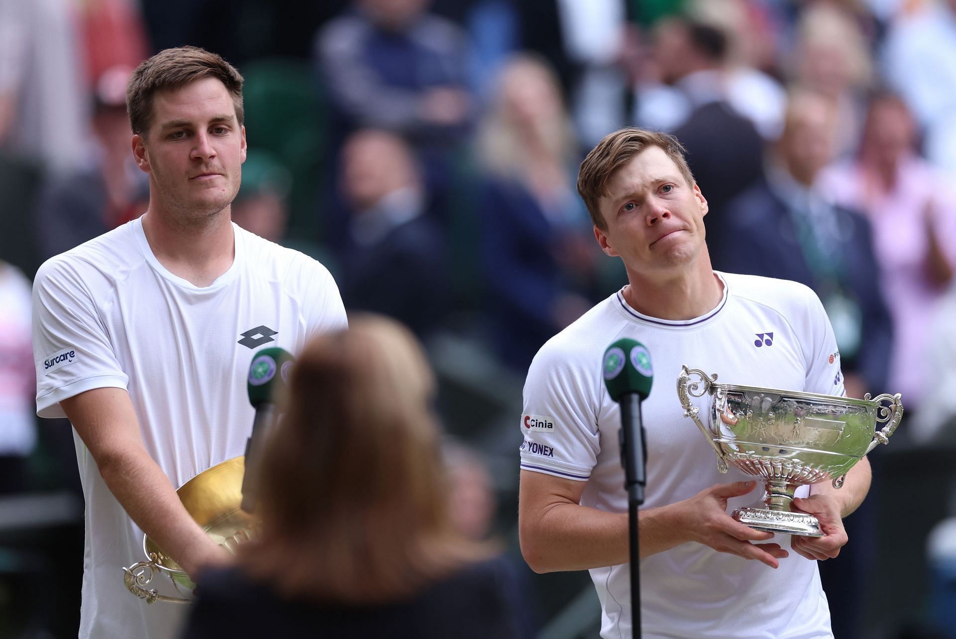 Heliovaara and Patten with their winners&#039; trophies