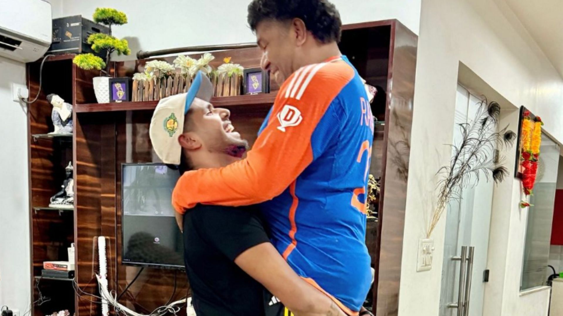 Harshit Rana celebrating his maiden India Call-up with his father (P.C.:Harshit Instagram)