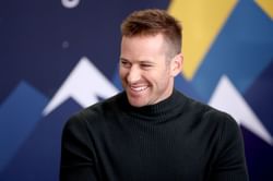 "Maybe the furthest I've ever seen Piers sit from a guest" — Internet reacts to Armie Hammer's revelatory interview with Piers Morgan