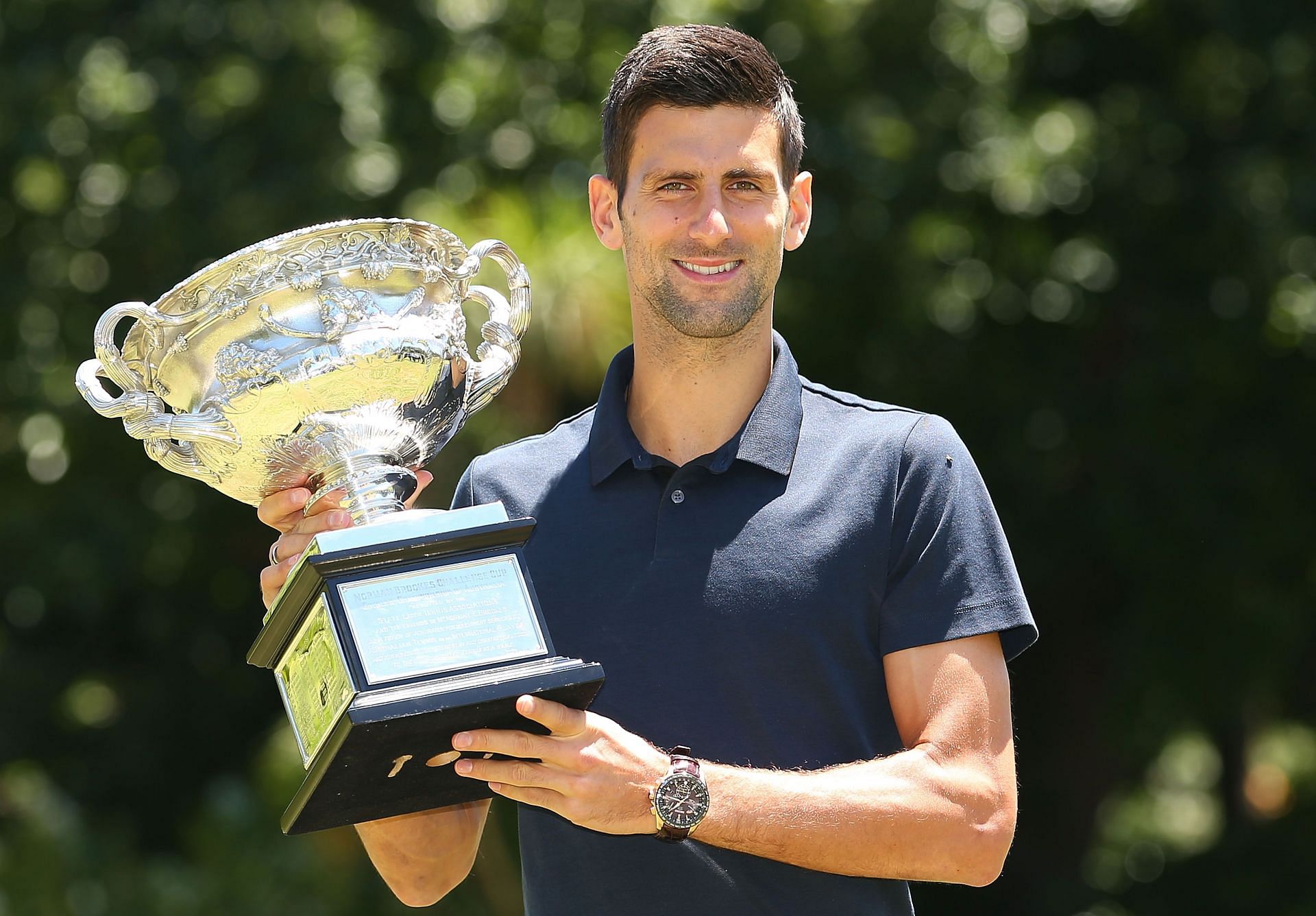 Novak Djokovic pictured with the 2106 Australian Open trophy