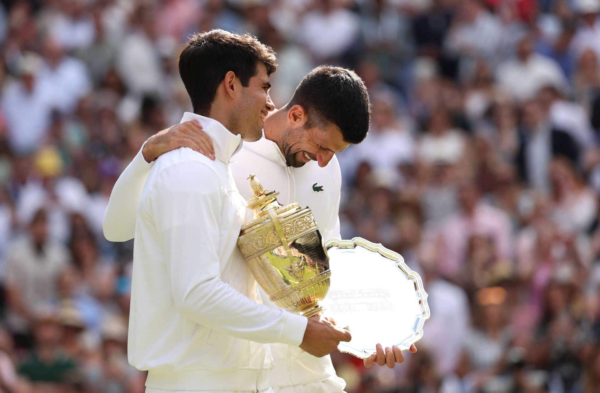 Carlos Alcaraz and Novak Djokovic with the Wimbledon trophies (Source: GETTY)