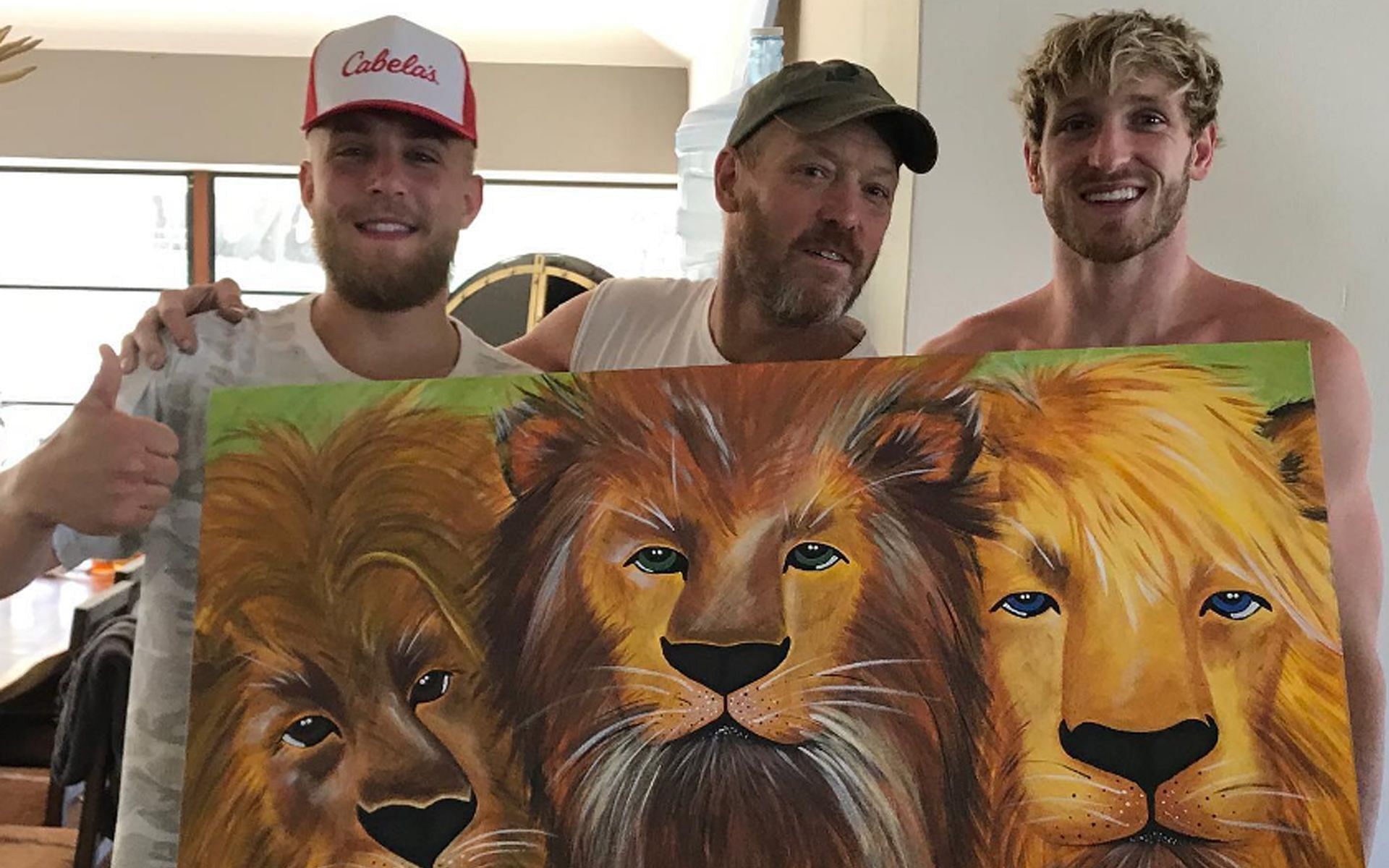 Greg Paul (center) with his sons Jake Paul (left) and Logan Paul (right) [Image courtesy: @gregpaul63 on Instagram]