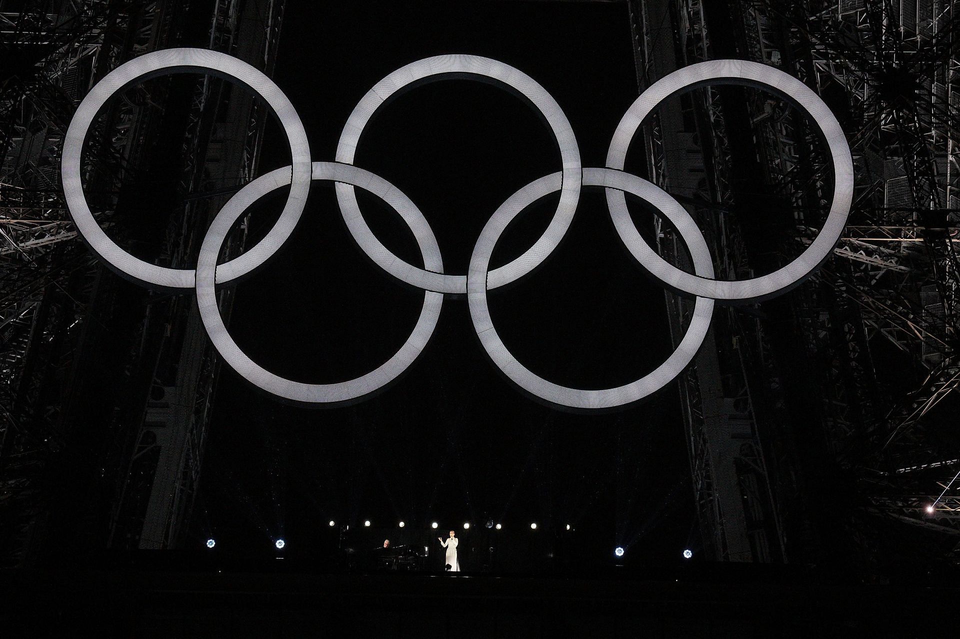 Celine Dion performing on the Eiffel Tower at the opening ceremony [Image Source: Getty]