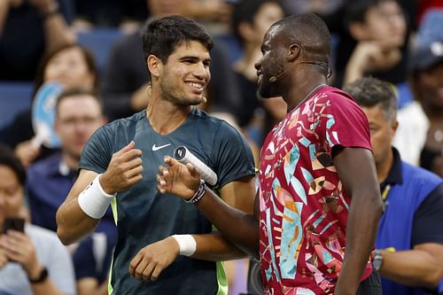 Carlos Alcaraz (L) and Frances Tiafoe