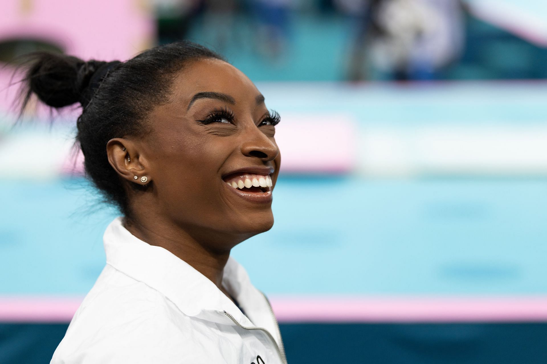 Simone Biles smiles during the Artistic Gymnastics Women&#039;s Team Final at the Olympic Games 2024 in Paris, France on July 30, 2024. (Photo by Getty Images)