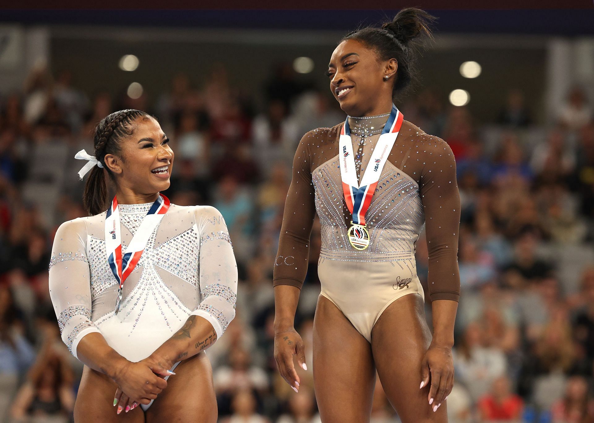 Jordan Chiles and Simone Biles on the podium at 2024 Xfinity U.S. Gymnastics Championships (Photo by Elsa/Getty Images)