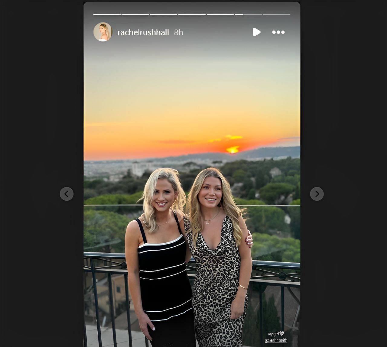 Rachel and Aleah with the sun setting in the background.