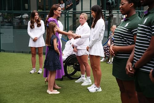 Emma Raducanu pictured with Catherine, Princess of Wales and Princess Charlotte on the final day of Wimbledon 2024 (Image Source: Getty)