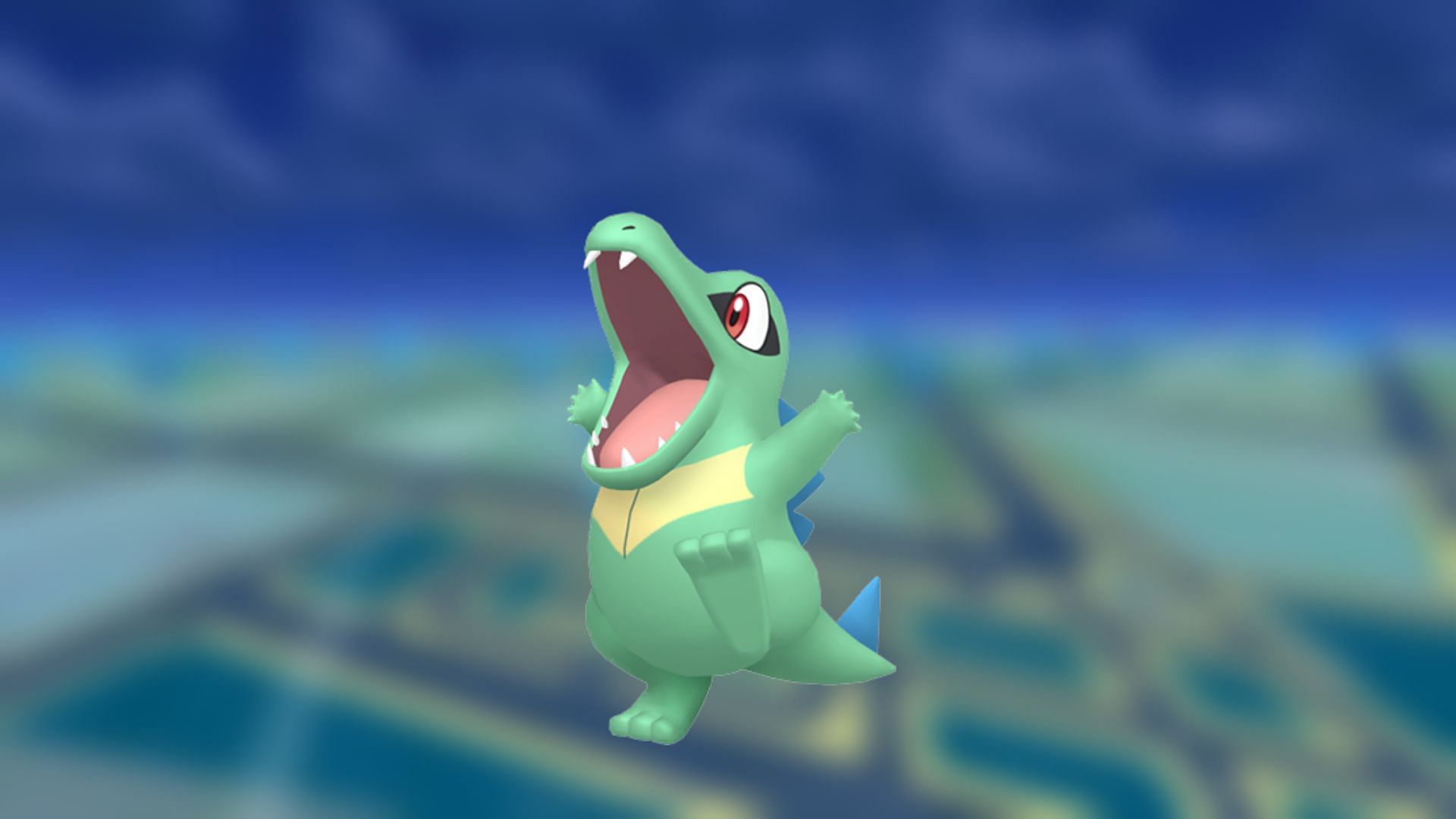 The deep blue accents of Shiny Totodile&#039;s spines work well with the mellow shade of green on its body (Image via The Pokemon Company)