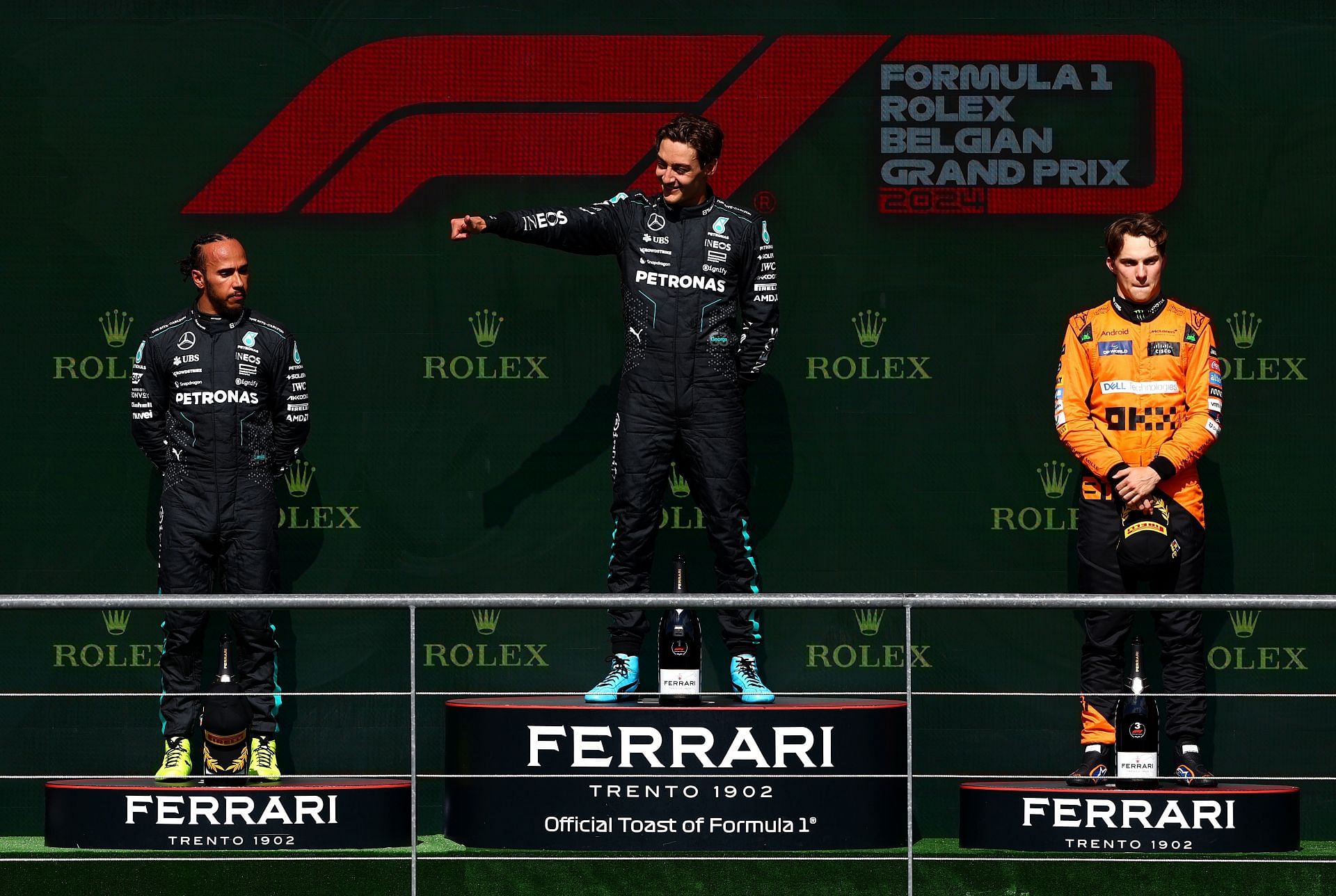 George Russell, Lewis Hamilton and Oscar Piastri on the podium during the F1 Grand Prix of Belgium at Circuit de Spa-Francorchamps on July 28, 2024 in Spa, Belgium. (Photo by Dean Mouhtaropoulos/Getty Images