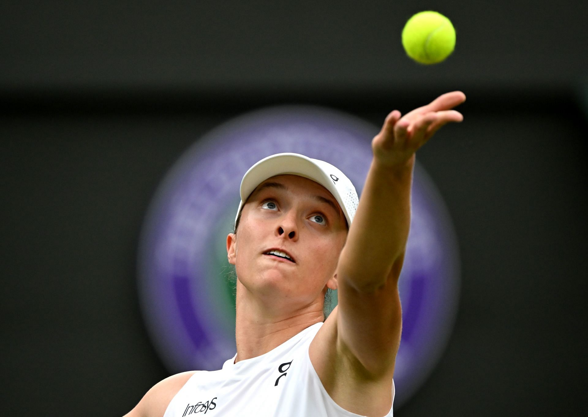 Iga Swiatek in action at Wimbledon