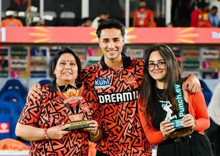 Abhishek Sharma with his mother Manju Sharma and sister Komal Sharma after winning the Player Of The Match award against CHennai Super Kings in IPL 2024 (Image Credits: Abhishek Sharma&#039;s Instagram)