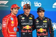 Max Verstappen, Charles Leclerc and Sergio Perez talk in parc ferme. (Image via Getty)