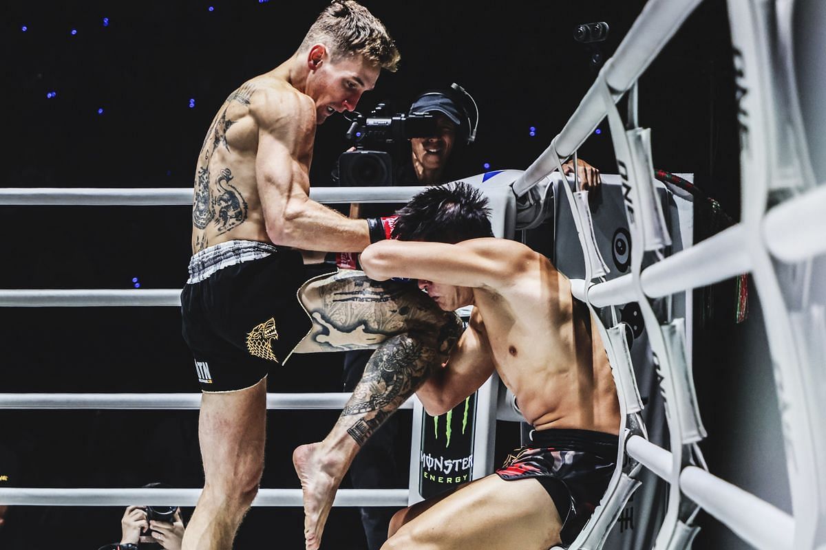 Nico Carrillo (left) applying the finishing touch at ONE Fight Night 23.