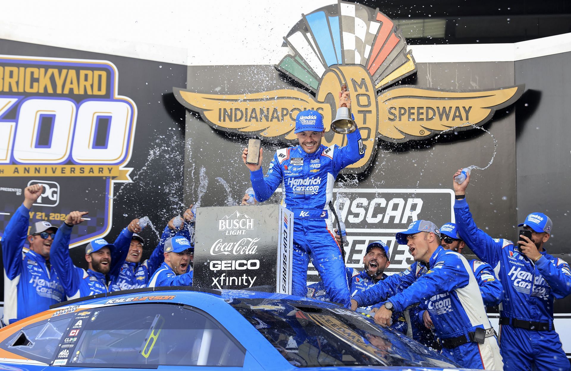 Kyle Larson, driver of the #5 HendrickCars.com Chevrolet, celebrates in victory lane after winning the NASCAR Cup Series Brickyard 400 at Indianapolis Motor Speedway on July 21, 2024 in Indianapolis, Indiana. (Photo by Justin Casterline/Getty Images)