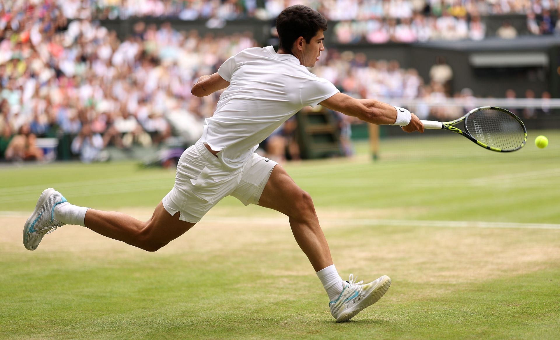 Carlos Alcaraz in action at the 2024 Wimbledon Championships