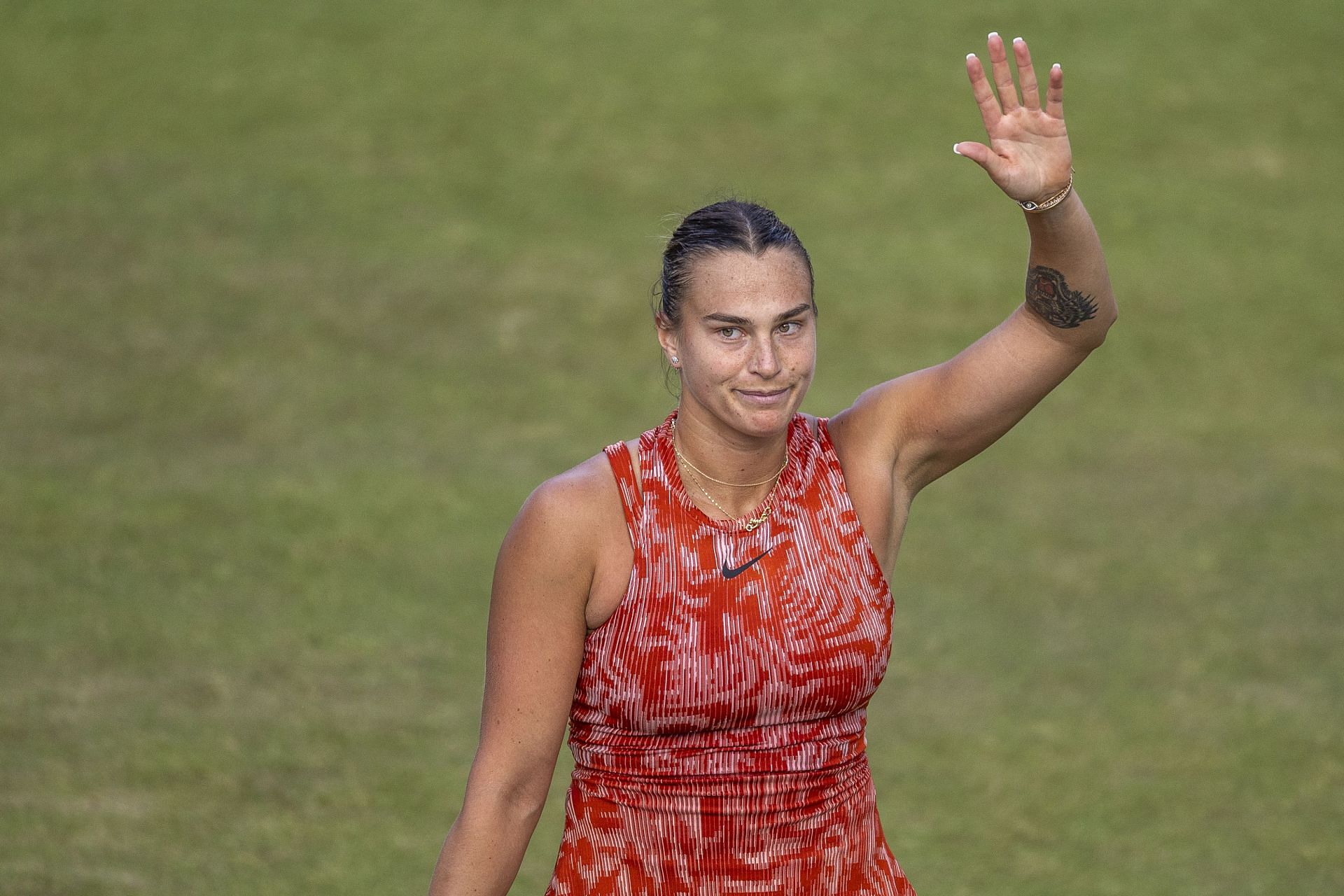 Aryna Sabalenka and her tiger tattoo.