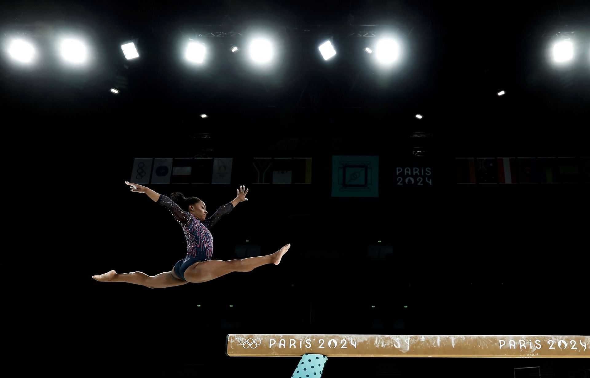 Simone Biles of the USA in action before the start of the gymnastics competition at the Paris Olympics [Getty]