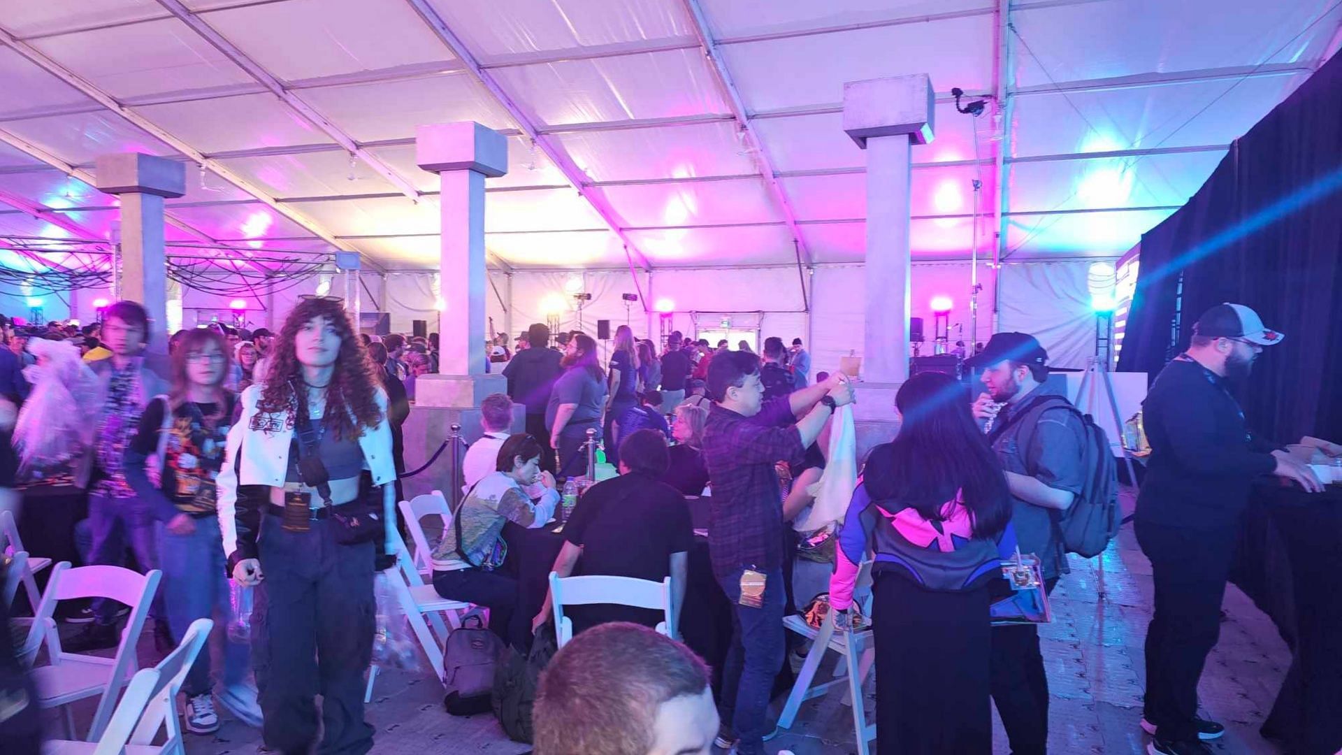 Day 1 featured a great party where fans could come together, listen to 90s music, and get their merch a day early (Image via Sportskeeda)