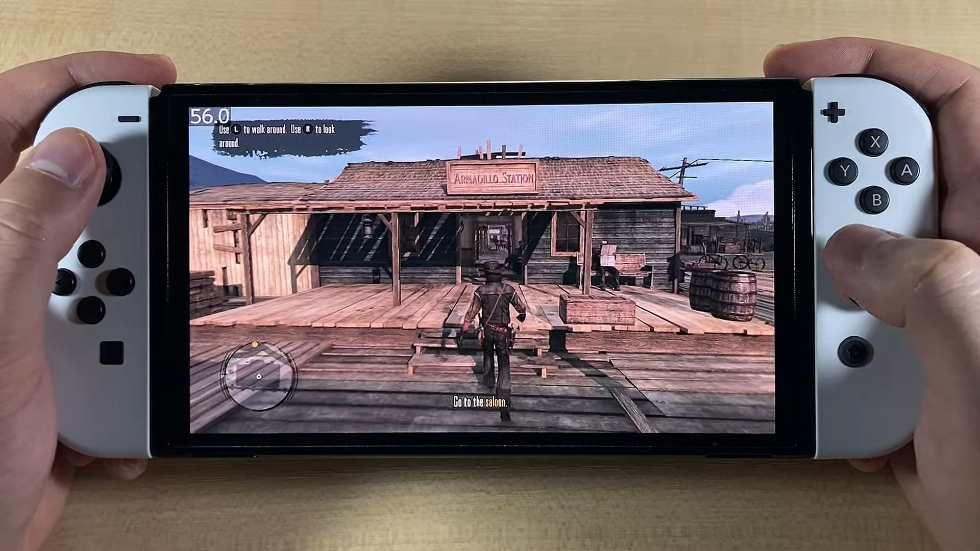 The Switch OLED is not bad either and runs RDR 2 really well (Image via YouTube/Handheld Gaming)