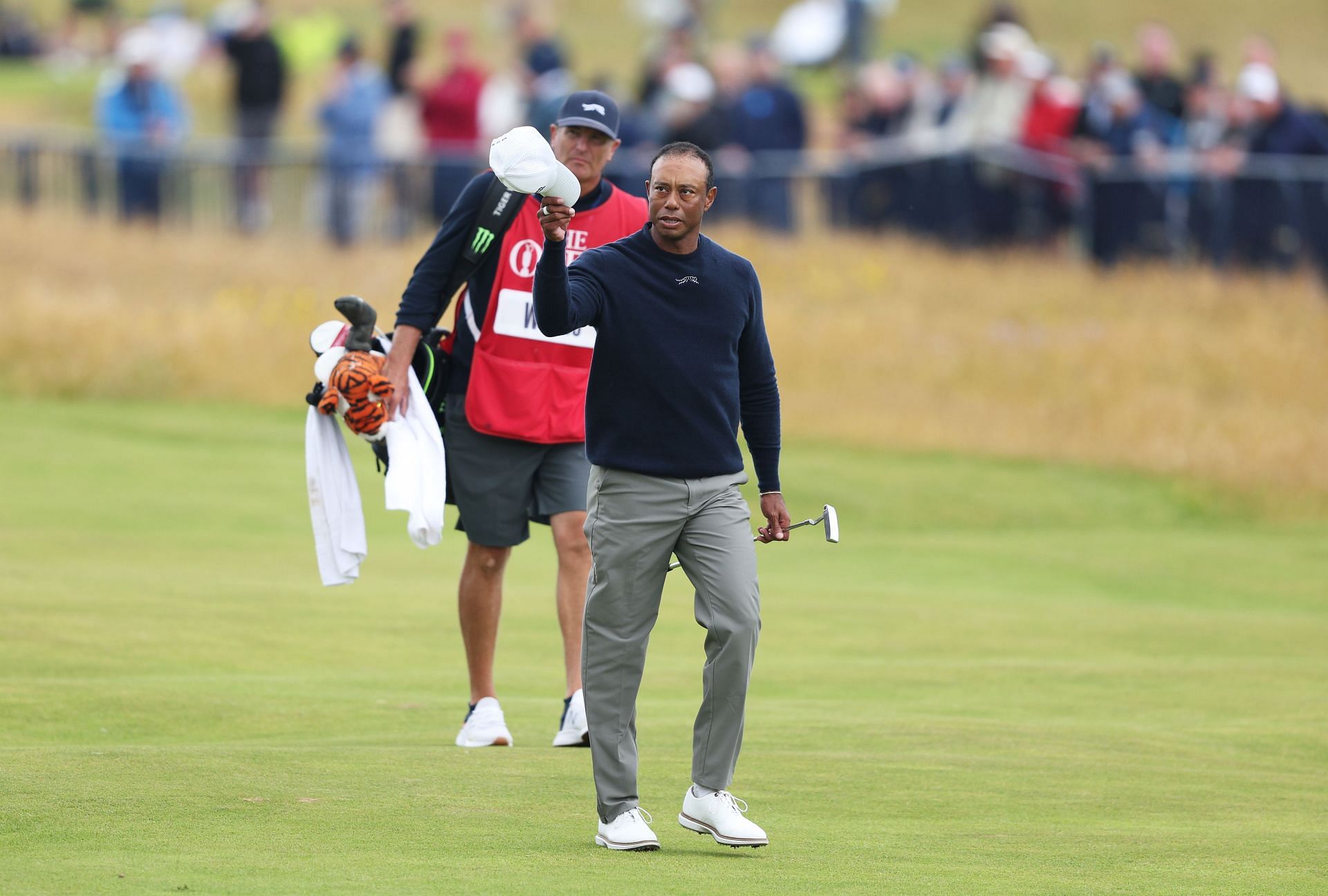 Tiger Woods acknowledges the crowd in the Royal Troon Golf Club at the 152nd Open - Day Two. Images via Getty Images