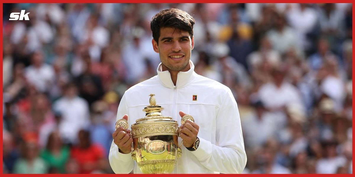 Carlos Alcaraz with the Wimbledon 2024 trophy.