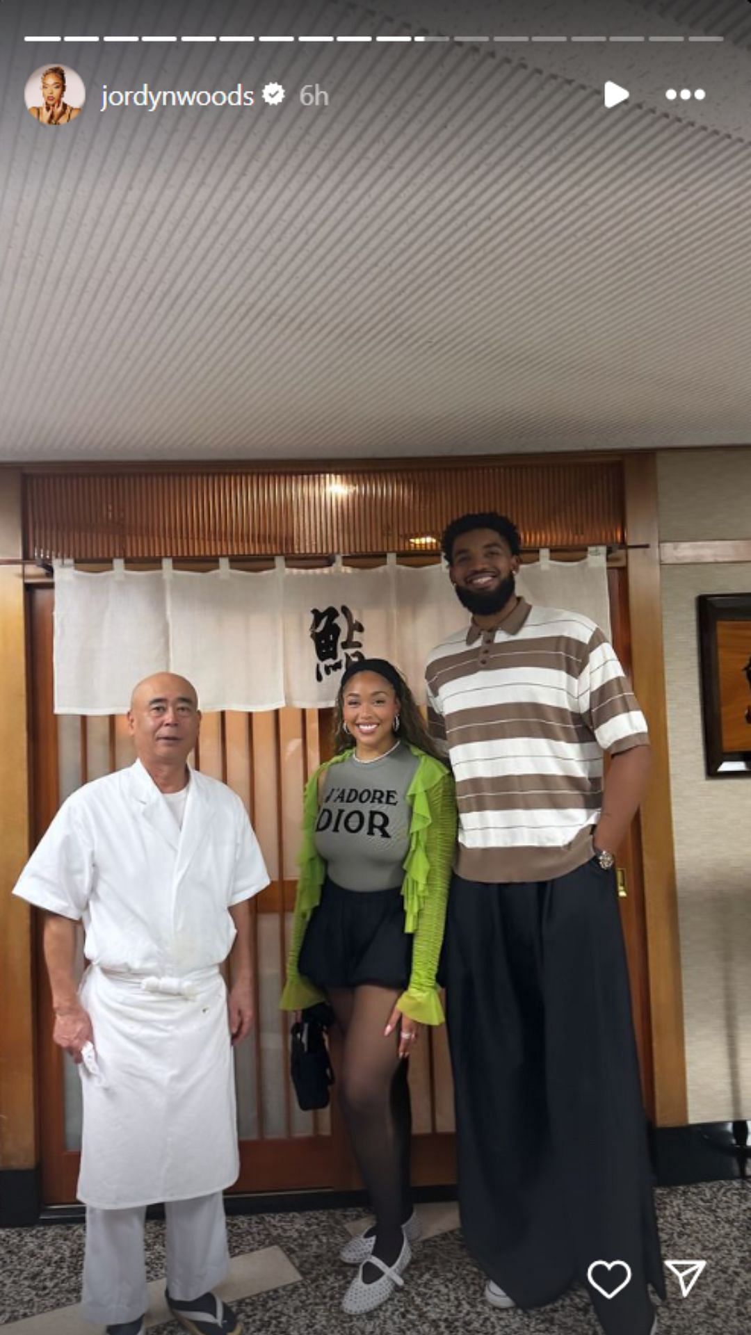 Woods and Towns pose alongside the chef at their private omakase lunch in Tokyo (Image: Jordyn Woods Instagram)