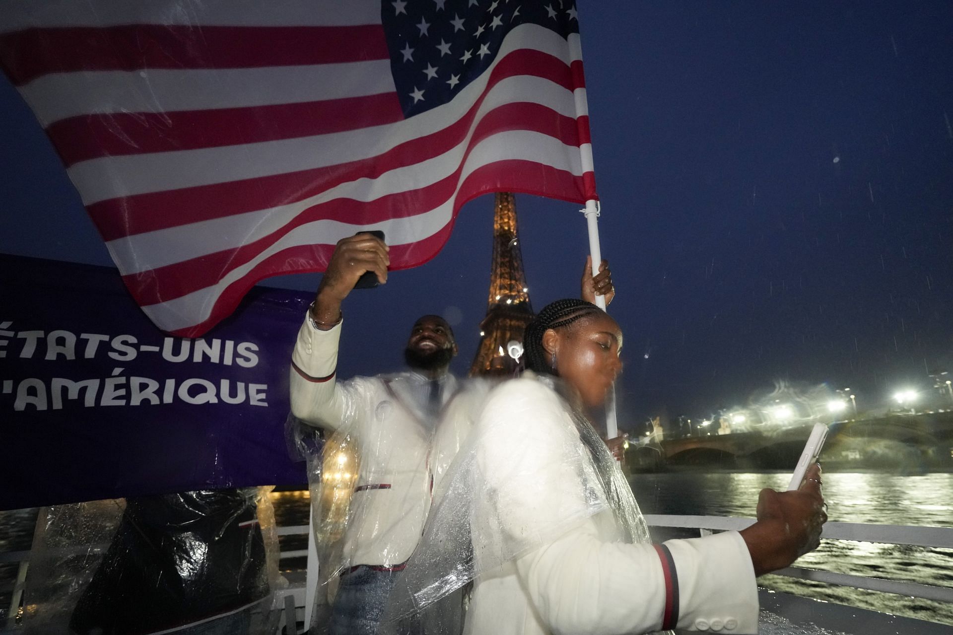 LeBron James (L) and Coco Gauff (R) during the rain-soaked 2024 Paris Olympics Opening Ceremony (Source: Getty)