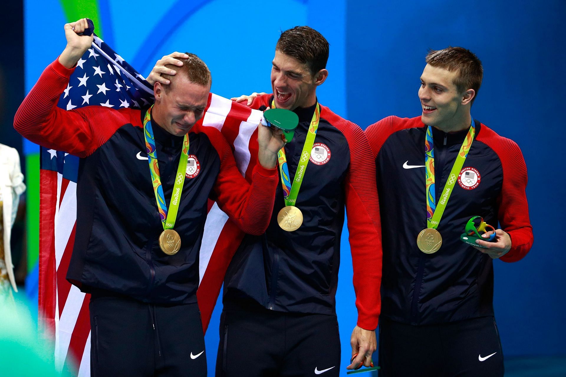 Michael Phelps embracing Caeleb Dressel at Rio Olympics [Image Source: Getty]