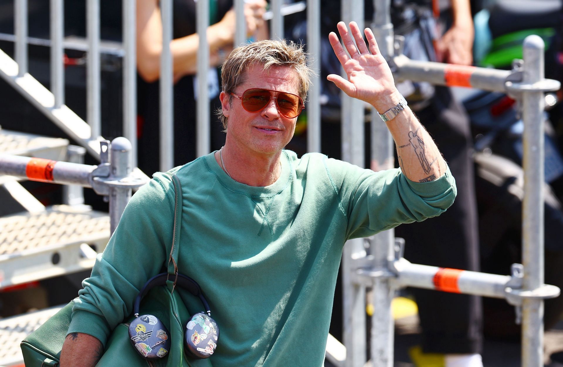 Brad Pitt, star of the upcoming Formula One based movie, F1, waves to the crowd prior to practice ahead of the F1 Grand Prix of Hungary at Hungaroring on July 19, 2024 in Budapest, Hungary. (Photo by Mark Thompson/Getty Images)