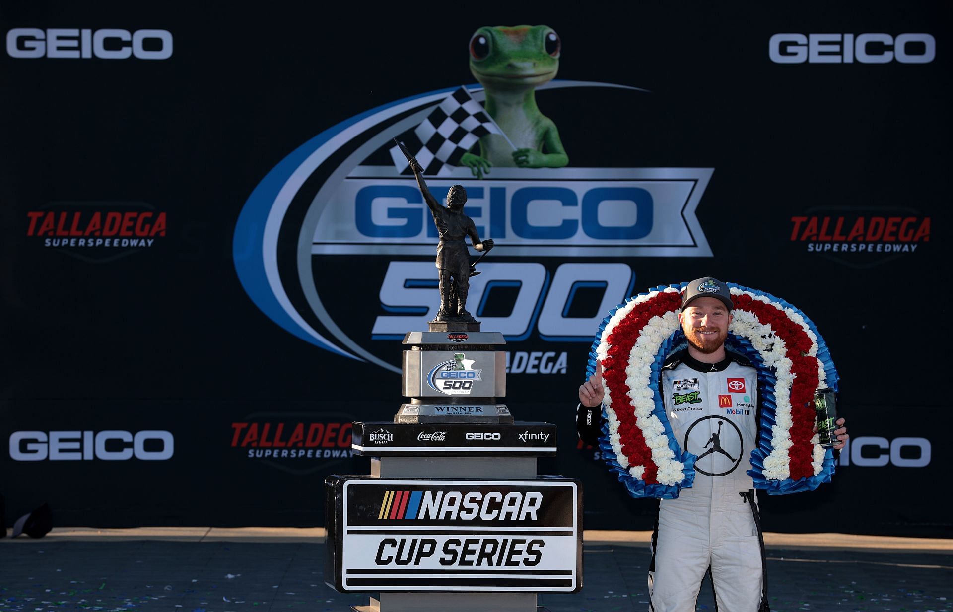 Tyler Reddick, driver of the #45 Jordan Brand Toyota, celebrates in victory lane after winning the NASCAR Cup Series GEICO 500 at Talladega Superspeedway on April 21, 2024 in Talladega, Alabama. (Photo by James Gilbert/Getty Images)