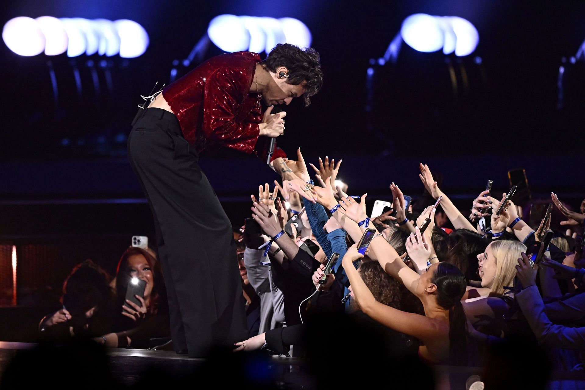 Harry Styles was seen kissing Emily Rajatowski in Tokyo in 2023 (Image via Getty Images)