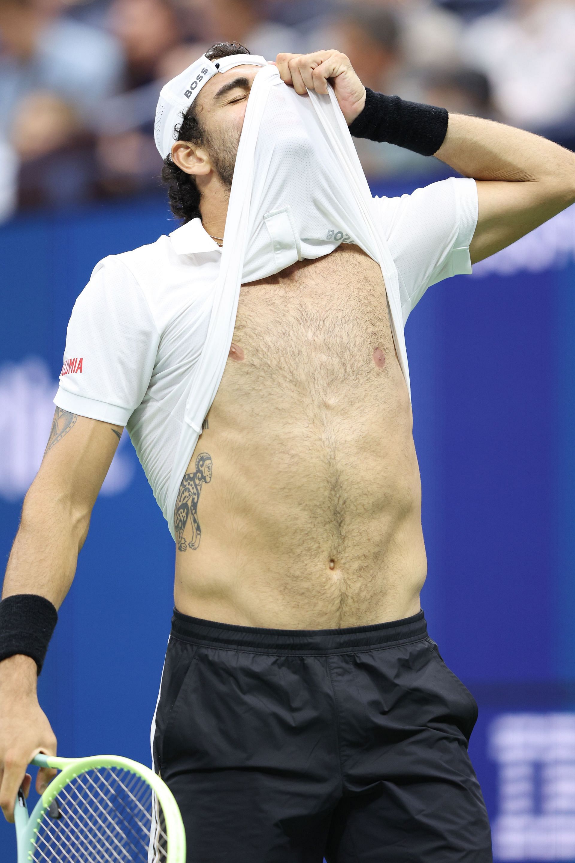 Matteo Berrettini sports a monkey tattoo.