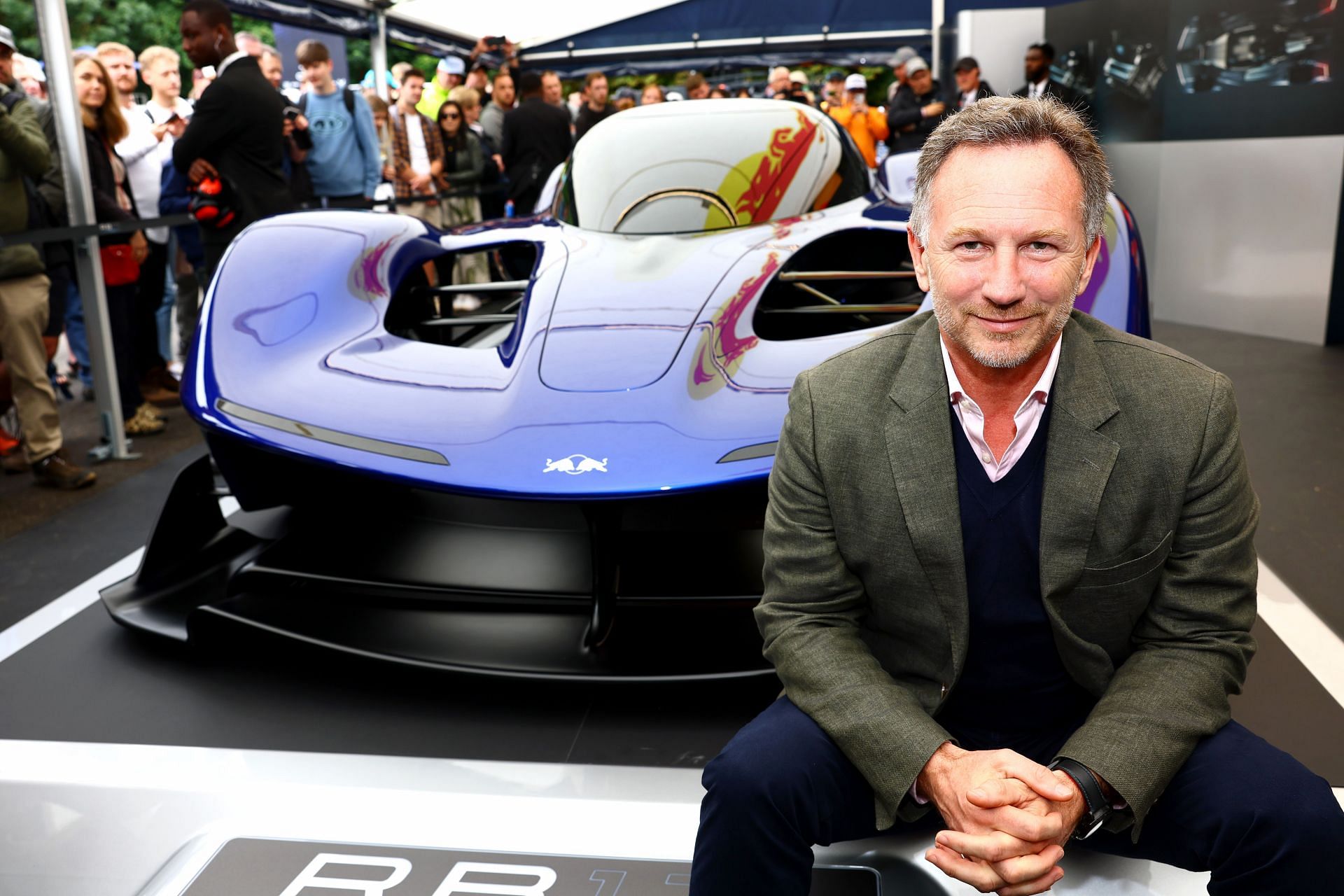 Oracle Red Bull Racing Team Principal Christian Horner poses for a photo with the newly unveiled Red Bull RB17 hypercar during Day Two of the Goodwood Festival of Speed at Goodwood on July 12, 2024 in Chichester, England. (Photo by Mark Thompson/Getty Images)