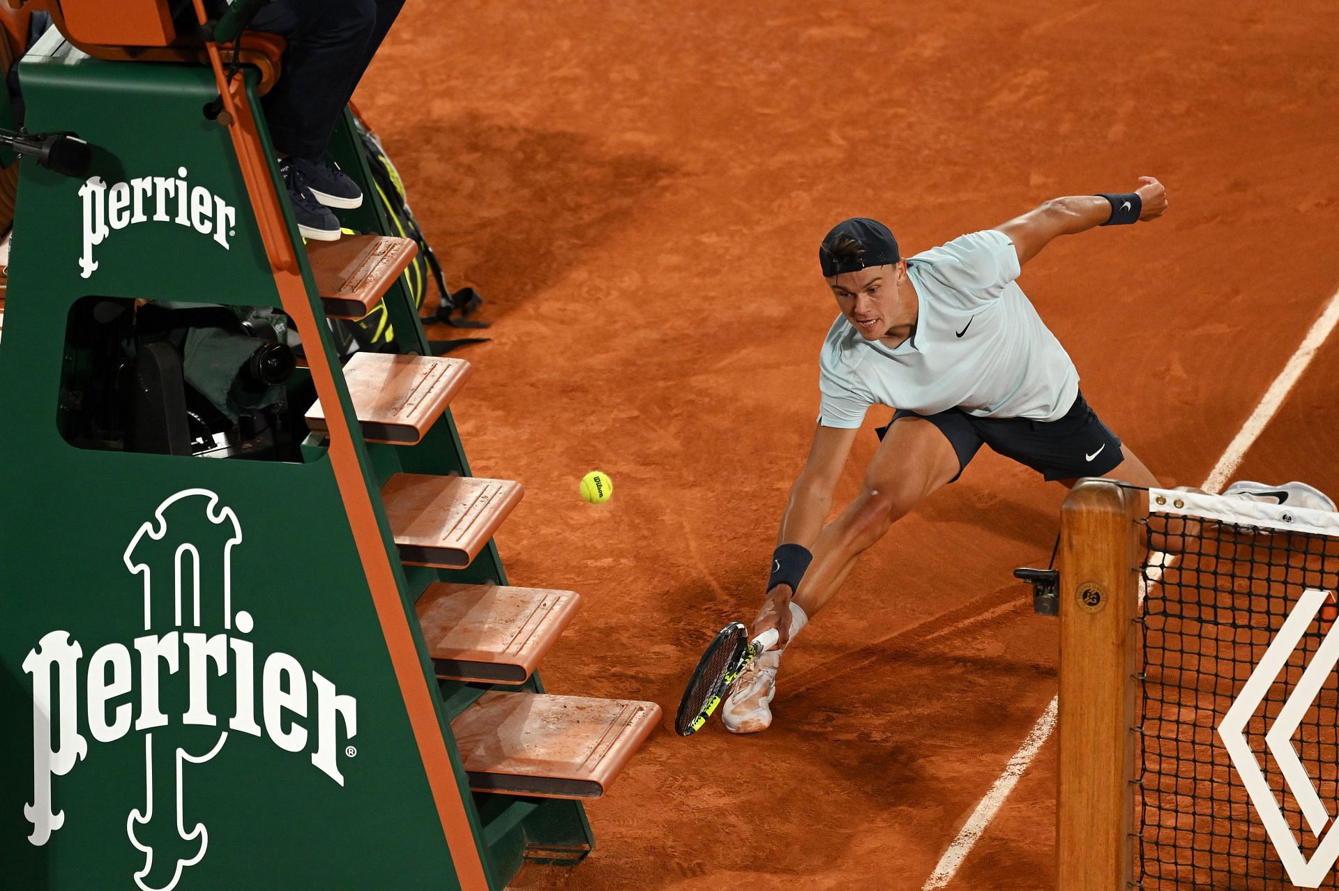 Holger Rune going for an around-the-net shot at the French Open 2024 (Getty Images)