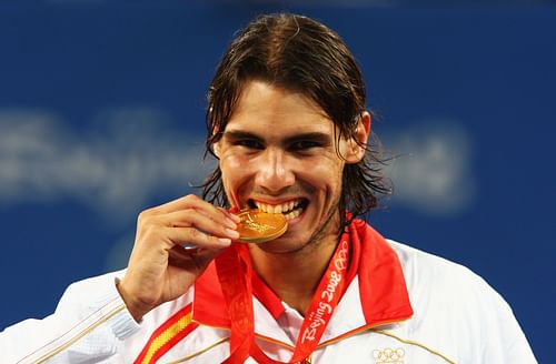 Rafael Nadal with the 2008 Beijing Olympics men's singles gold medal (Image via Getty)