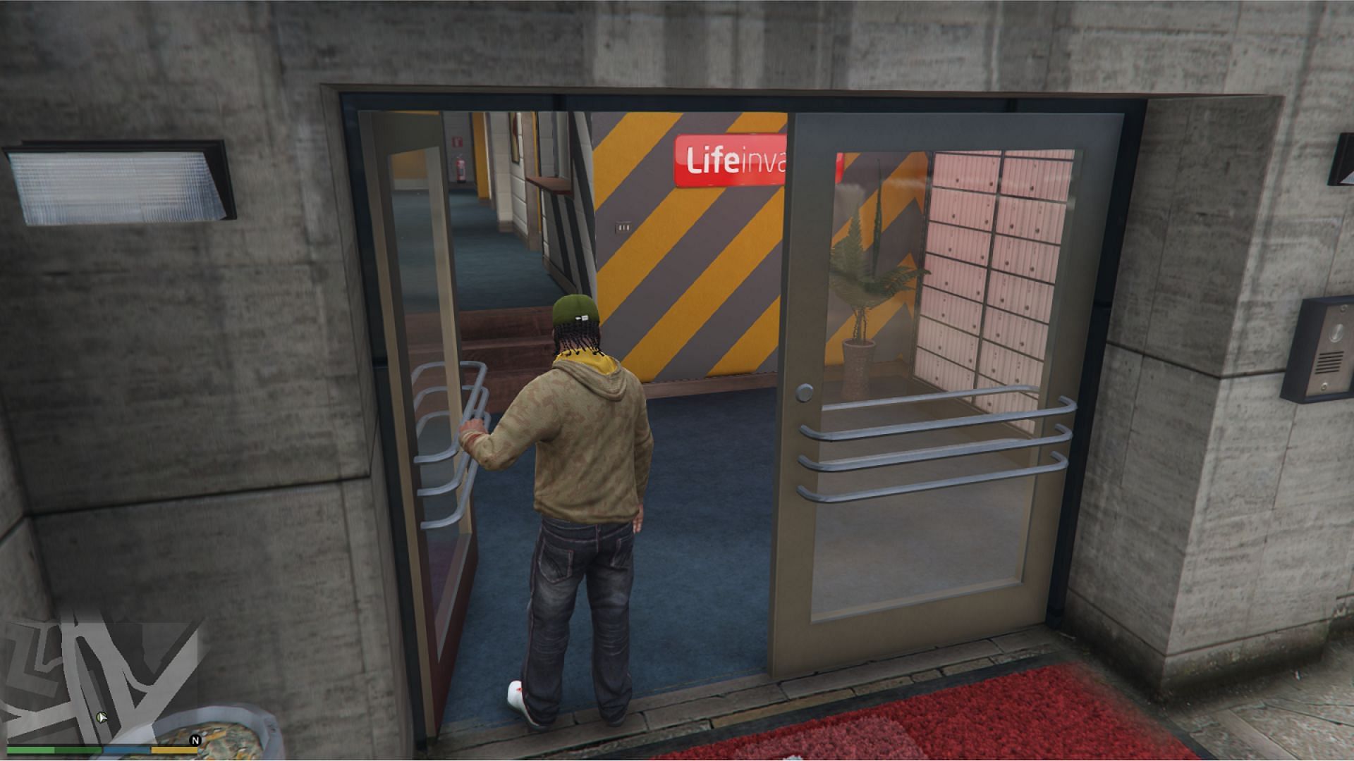 Franklin entering the LifeInvader building (Image via NewTheft)