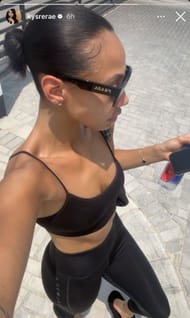 Jaylen Brown's girlfriend sported Prada eyeglasses with an all-black workout fit (image credit: instagram/kyrerae)