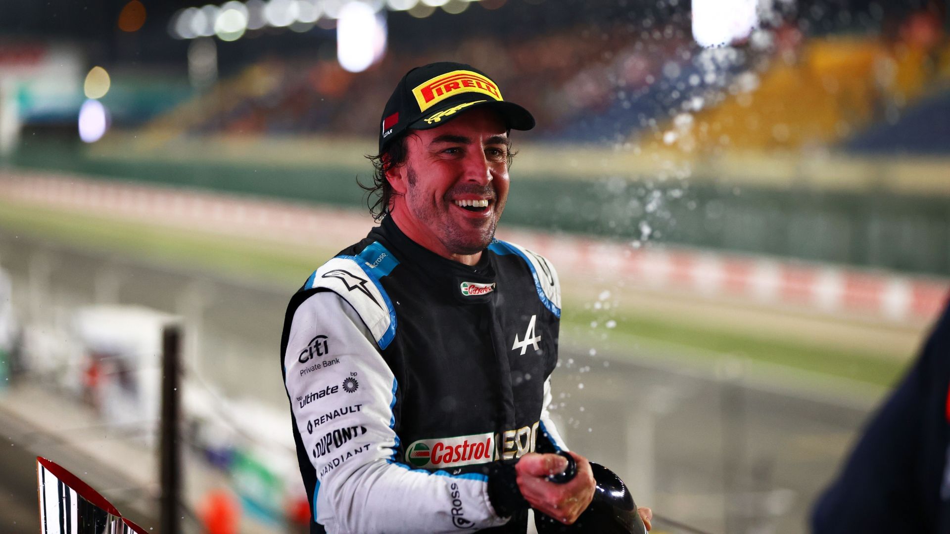 Fernando Alonso on the podium at Qatar in 2021 (Photo via Getty Images)