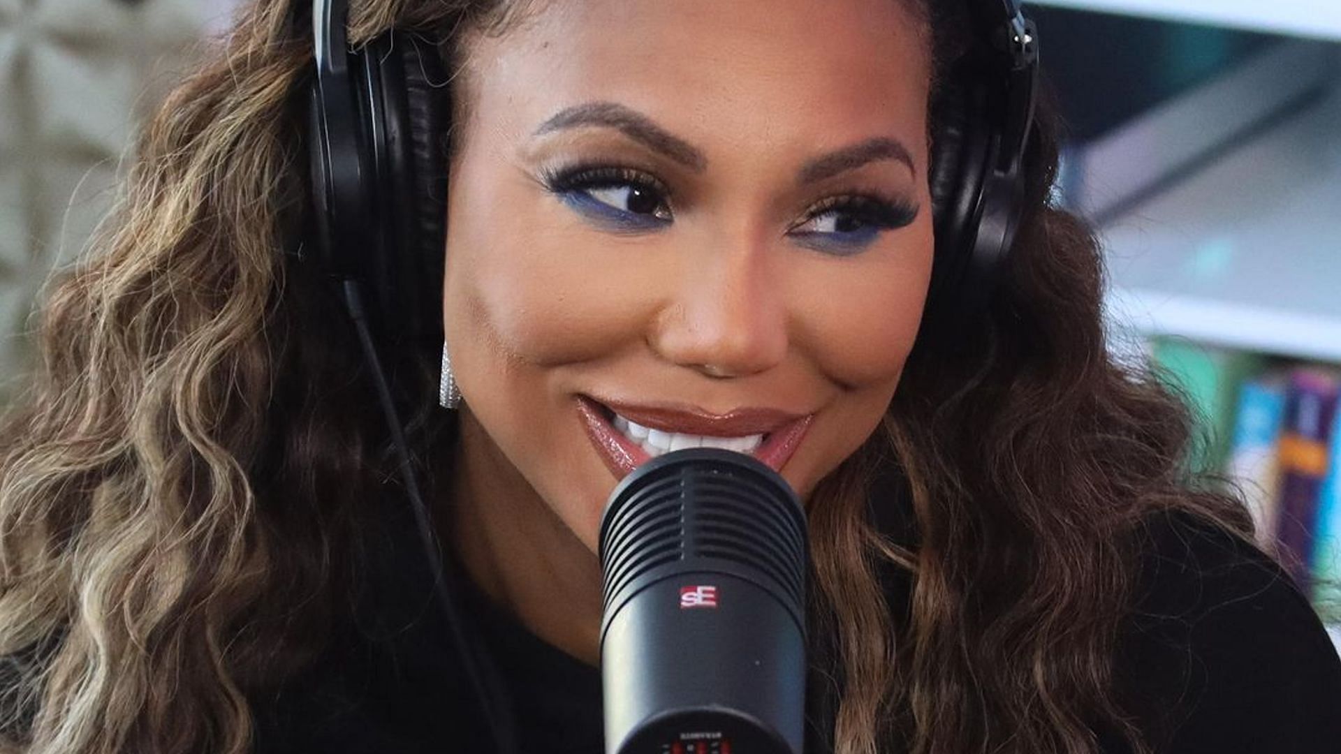 Tamar Braxton on a podcast (Image via Instagram/@tamarbraxton)