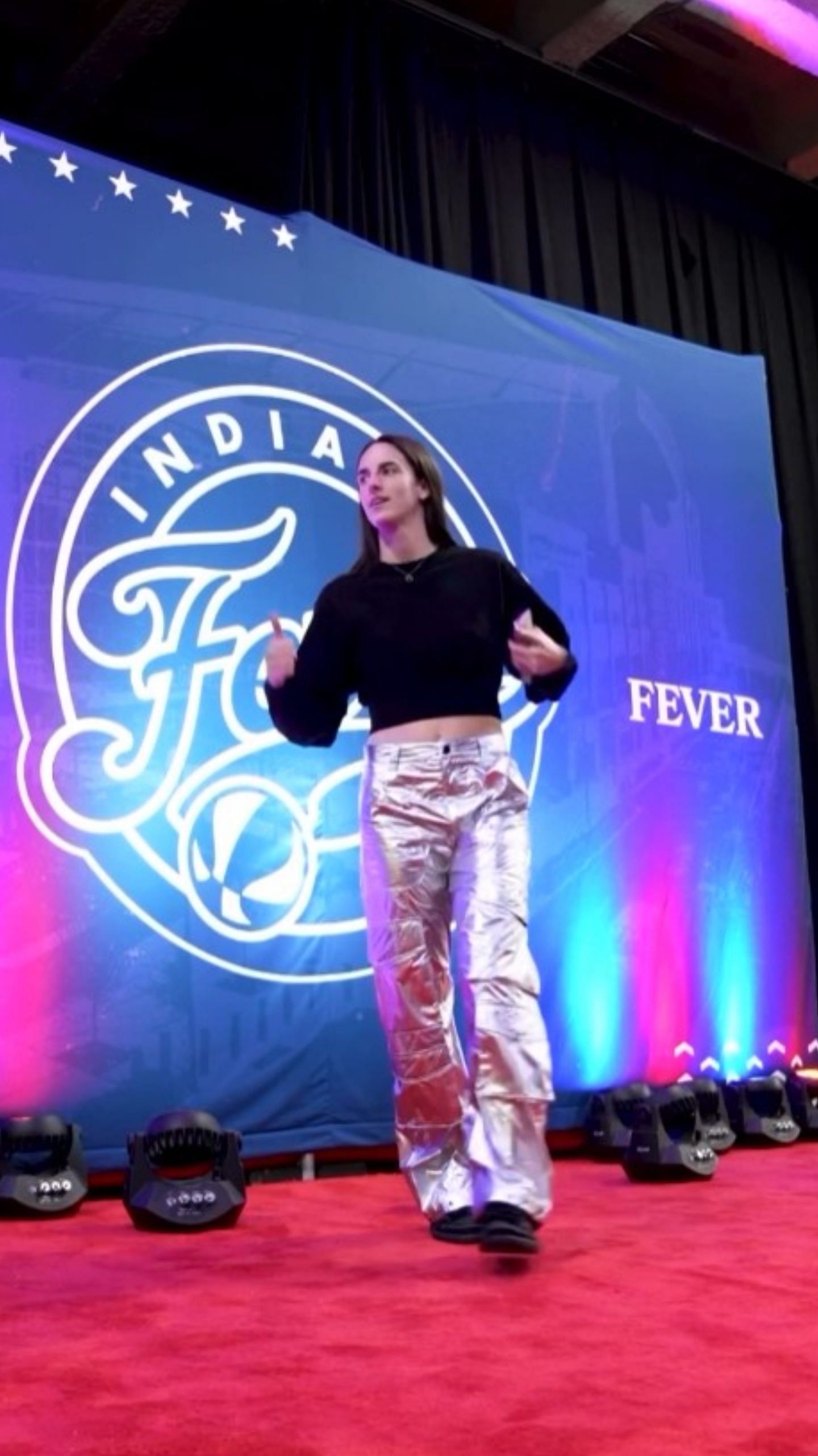 Clark puts on a pair of metallic grey pants for the Sun-Fever game / Image credit: @indianafever on IG