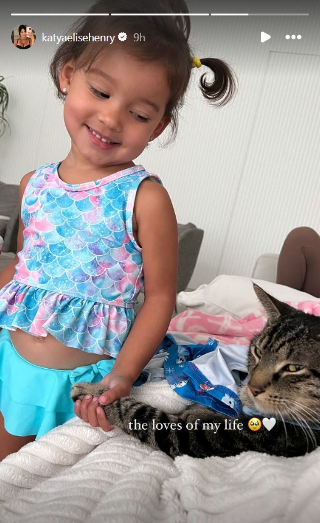 Tyler and Katya&#039;s daughter Zya playing with their cat (Image: Katya Elise Henry Instagram)