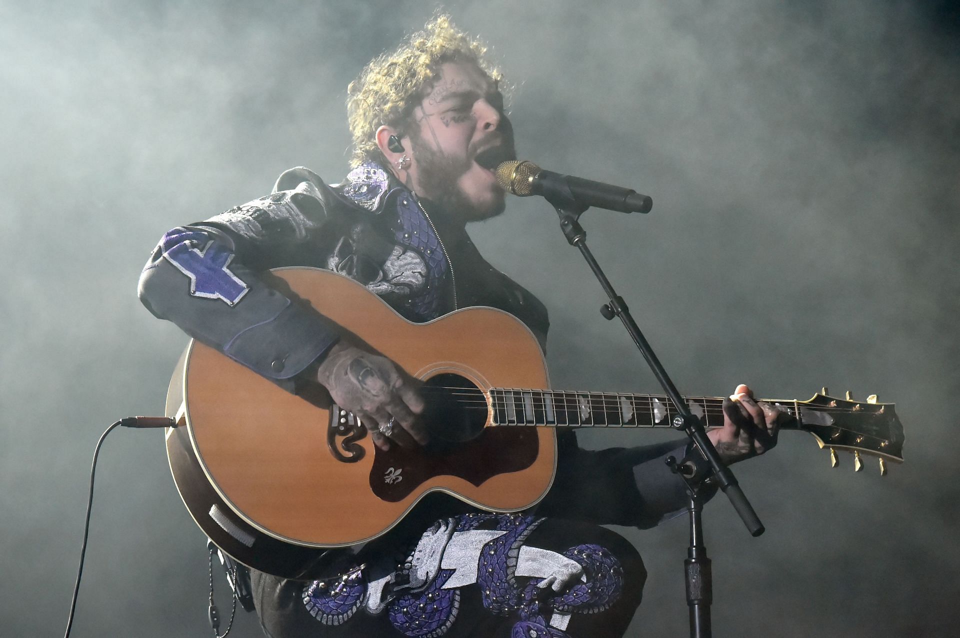 Post Malone performs onstage during the 61st AGA at Staples Center on February 10, 2019, in Los Angeles, California. (Image via Getty/Lester Cohen)