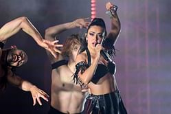 "Bratuniverse" — Internet reacts to Charli XCX's Guess featuring Billie Eilish being filmed in the location as Katy Perry's Woman's World